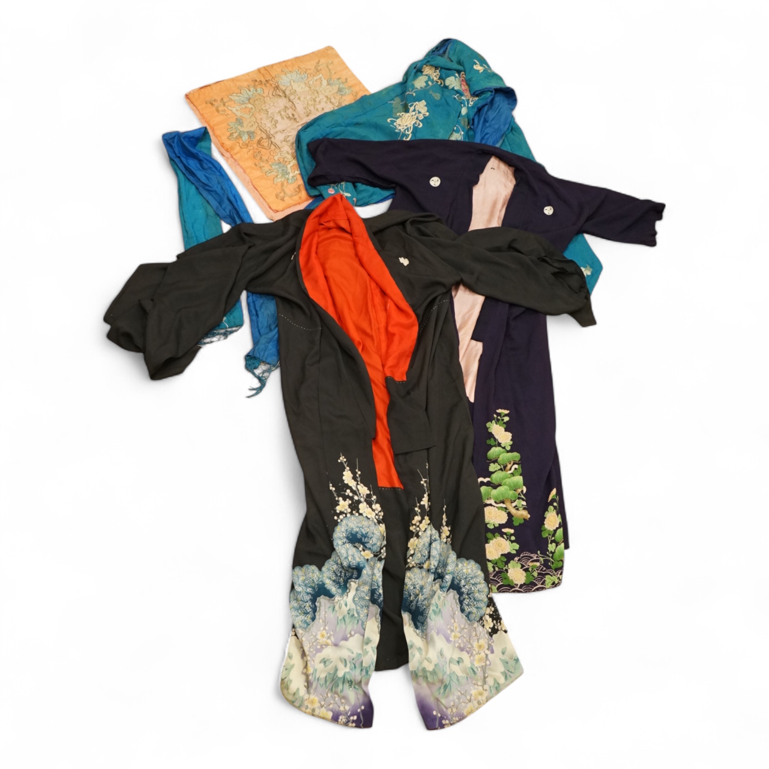 A collection of Chinese and Japanese embroidered kimonos and textiles